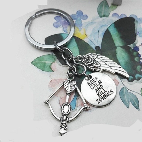 Zombie Dylier Bows and Arrows Pendant Key Chain in - Picture 1 of 7